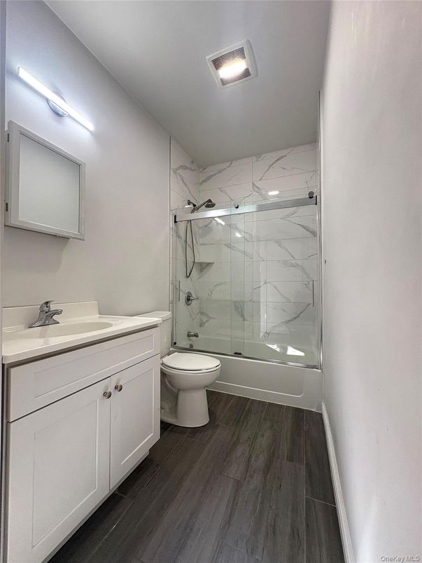 Bathroom, Glass Shower, Interior, Marble Walls, Wood Texture Flooring