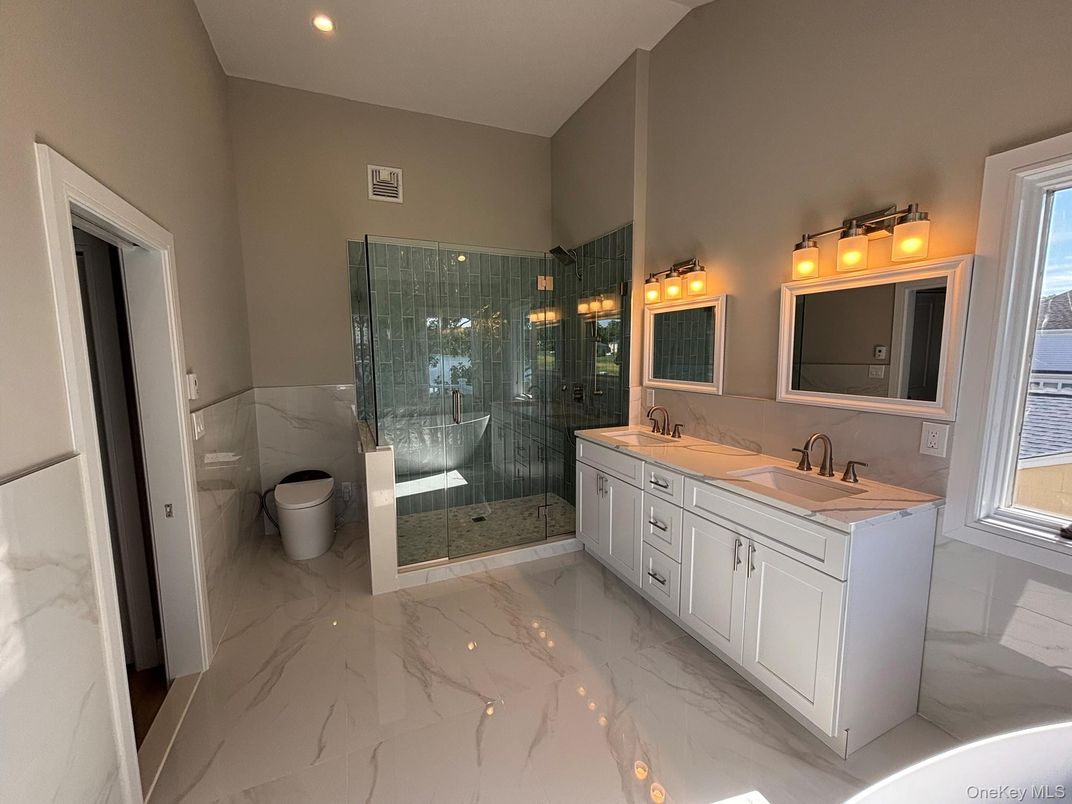 Bathroom, Dual Sink Vanities, Glass Shower, Interior, Marble, Recessed Lighting