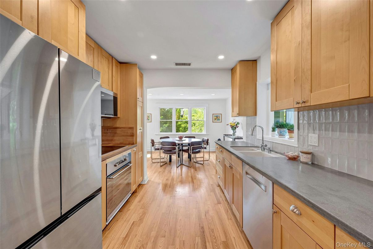 Dining room, Interior, Kitchen, Recessed Lighting, Stainless Steel Appliances, Wood Texture Flooring
