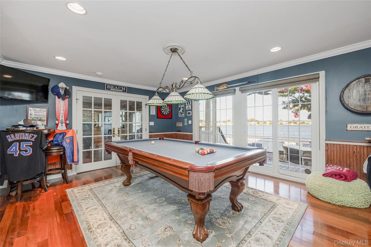 Billiard Table, Chandelier, Game Room, Interior, Pendant Lights, Recessed Lighting, Water, Wood Texture Flooring