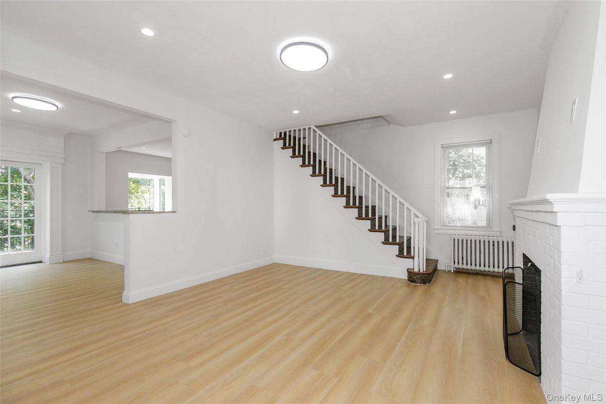 Empty room, Fireplace, Interior, Recessed Lighting, Wood Texture Flooring