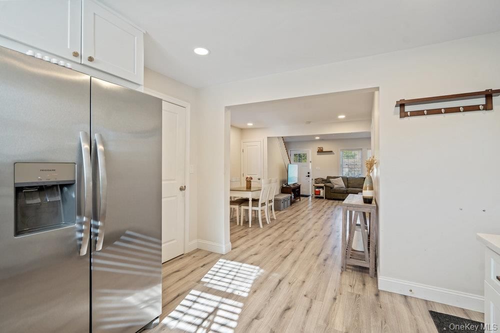 Dining room, Interior, Kitchen, Living room, Recessed Lighting, Stainless Steel Appliances, Wood Texture Flooring