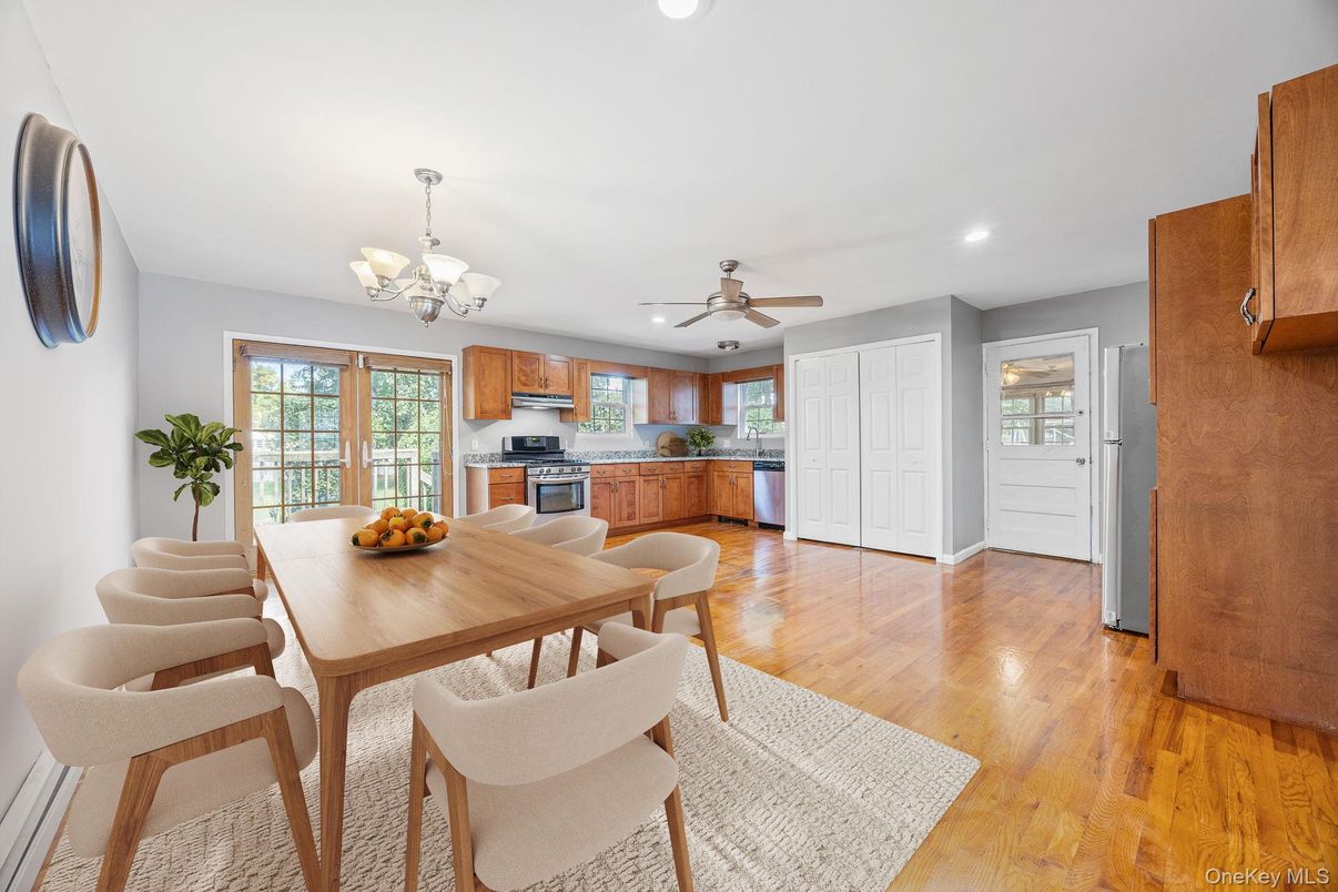 Chandelier, Dining room, Interior, Kitchen, Recessed Lighting, Stainless Steel Appliances, Wood Texture Flooring