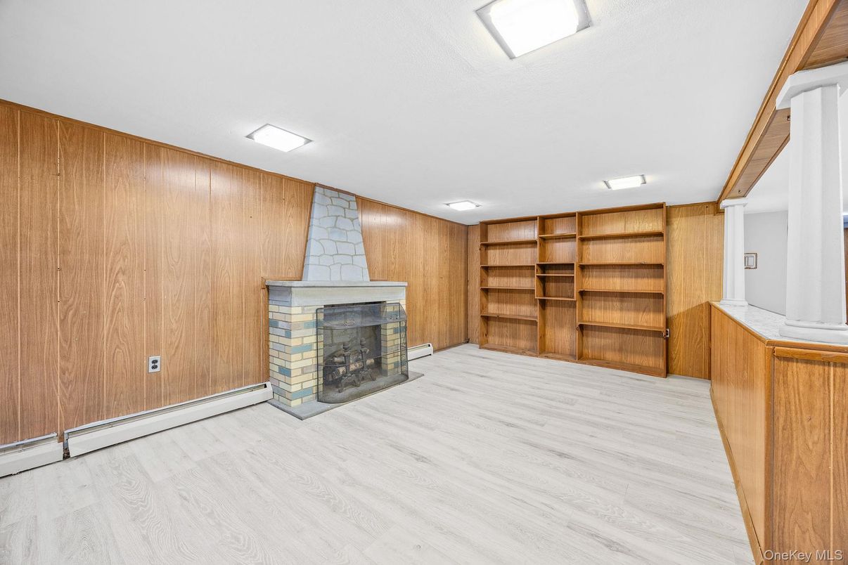 Empty room, Fireplace, Interior, Recessed Lighting, Wood Texture Flooring, Wooden Walls