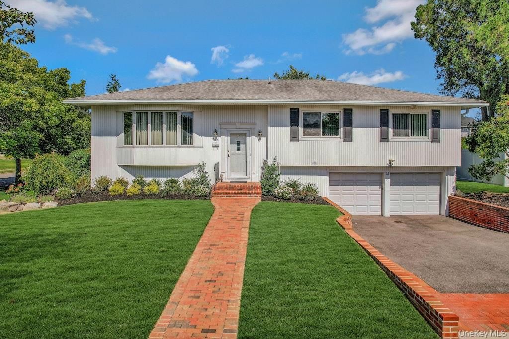 Attached, Exterior, Facade, Raised Ranch