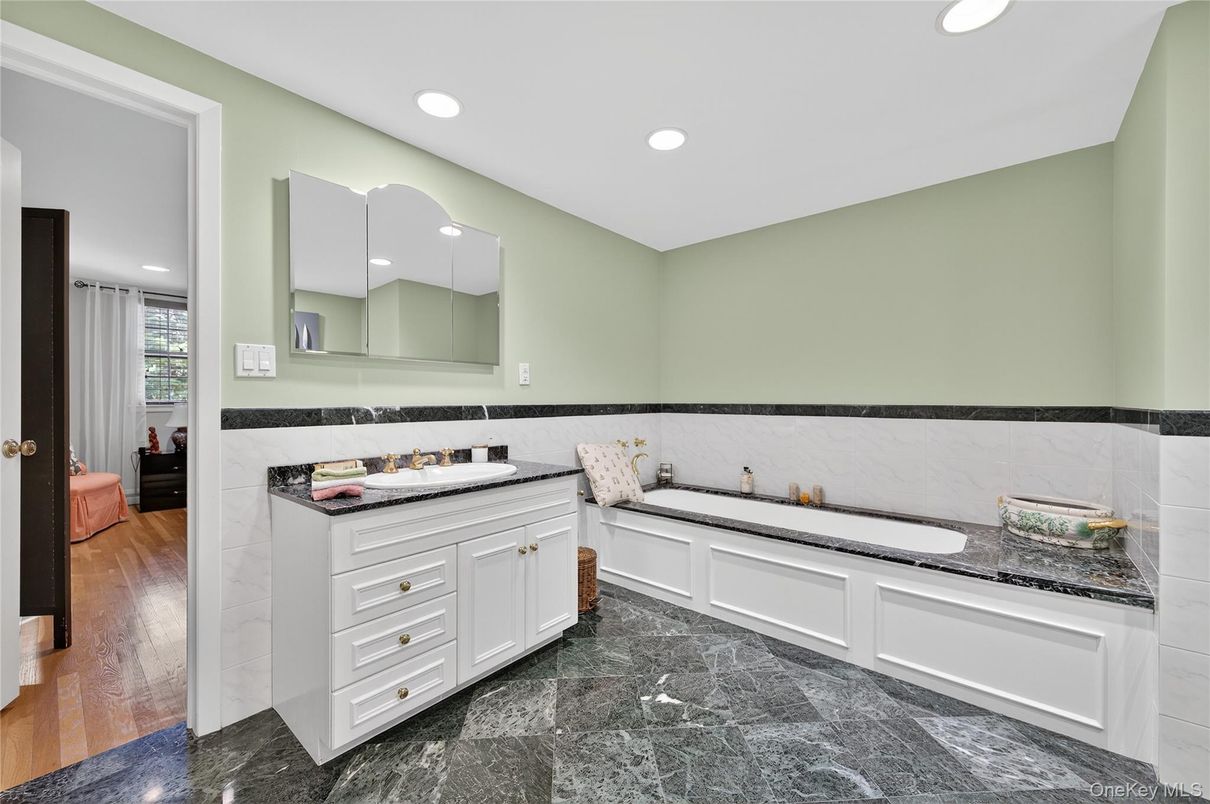 Bathroom, Dual Sink Vanities, Interior, Recessed Lighting, Wood Texture Flooring