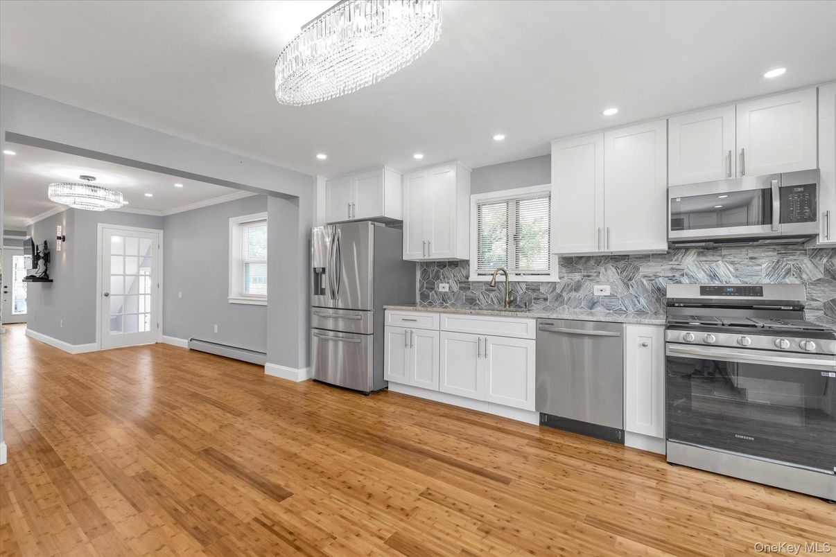 Chandelier, Interior, Kitchen, Recessed Lighting, Stainless Steel Appliances, Wood Texture Flooring