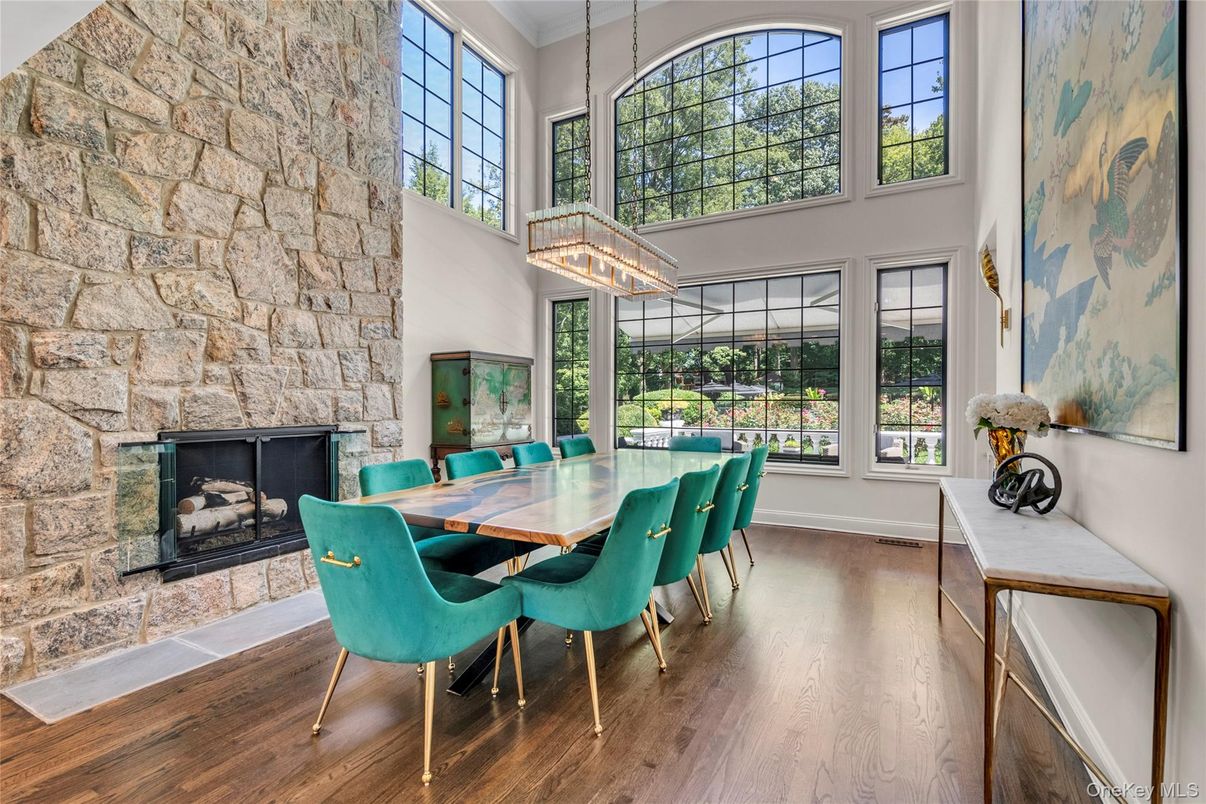 Dining room, Fireplace, Interior, Pendant Lights, Stone Walls, Wood Texture Flooring