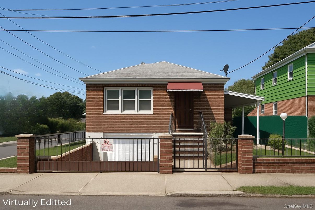 Exterior, Facade, Brick Facade, Raised Ranch