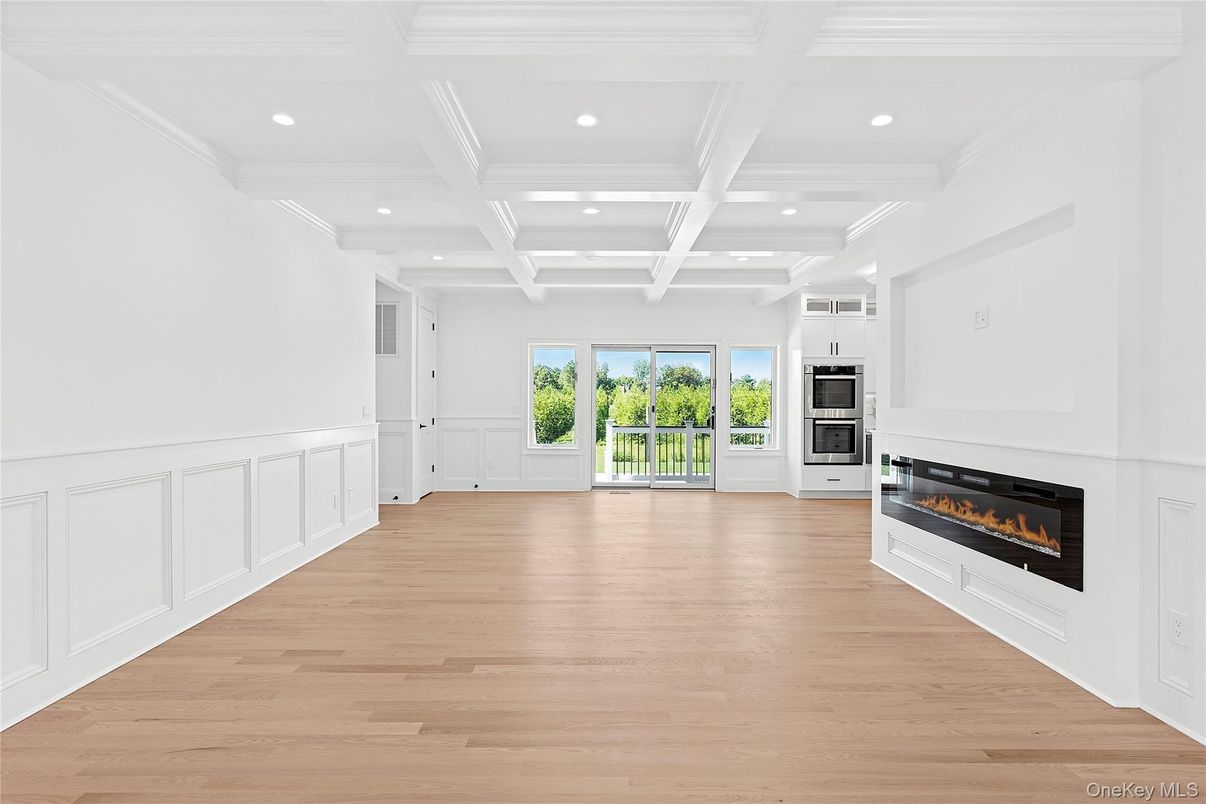 Empty room, Fireplace, Interior, Recessed Lighting, Wood Texture Flooring