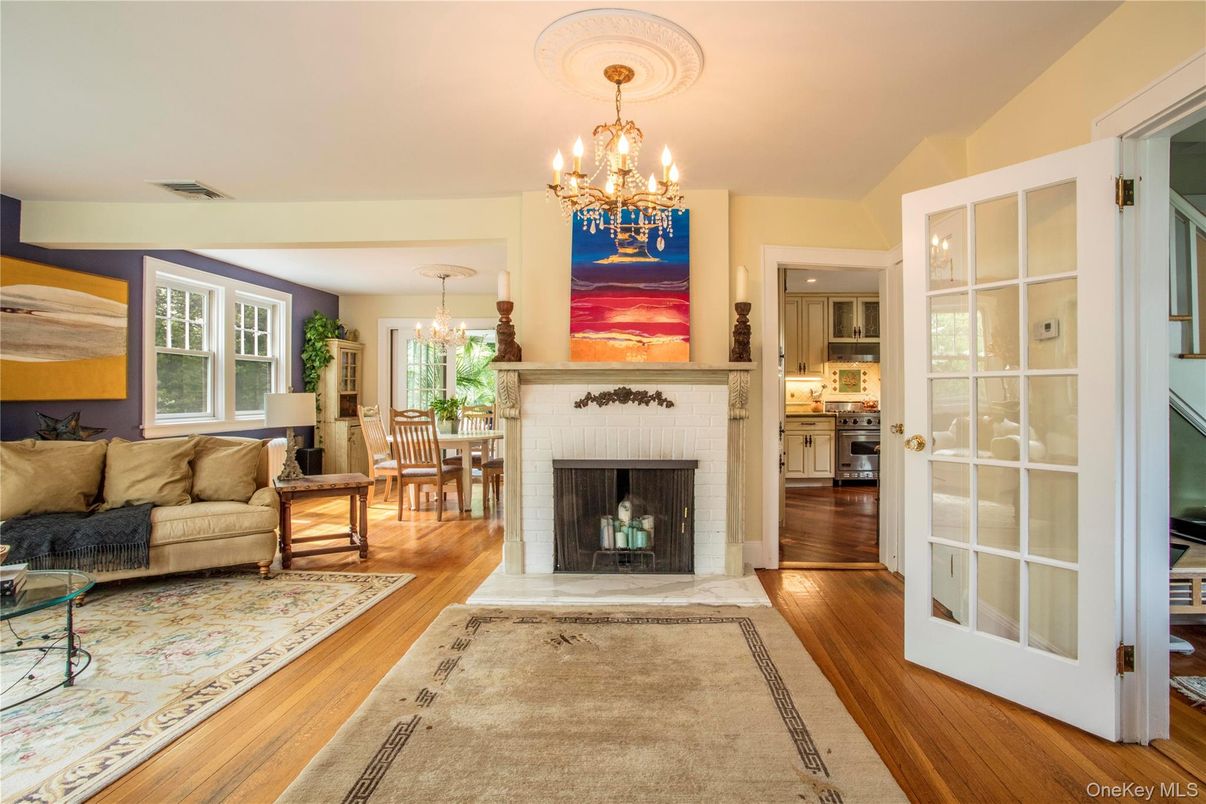 Chandelier, Dining room, Fireplace, Interior, Living room, Wood Texture Flooring