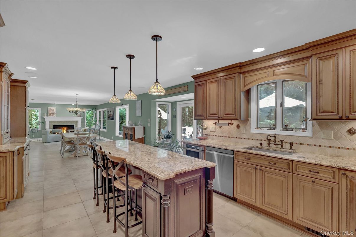 Dining room, Fireplace, Interior, Kitchen, Living room, Pendant Lights, Recessed Lighting, Stainless Steel Appliances