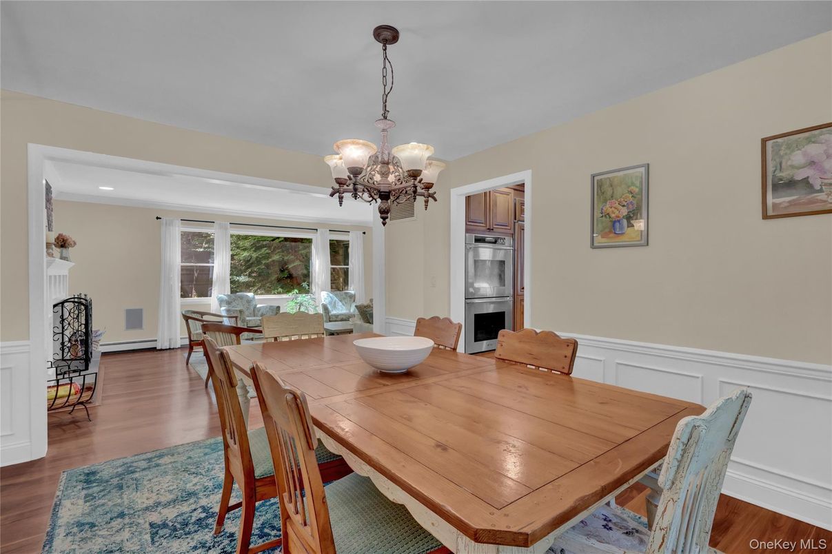 Chandelier, Dining room, Interior, Kitchen, Recessed Lighting, Stainless Steel Appliances, Wood Texture Flooring
