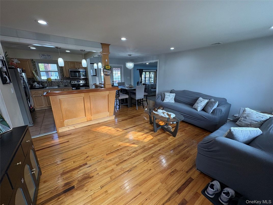 Chandelier, Dining room, Interior, Kitchen, Living room, Pendant Lights, Recessed Lighting, Wood Texture Flooring