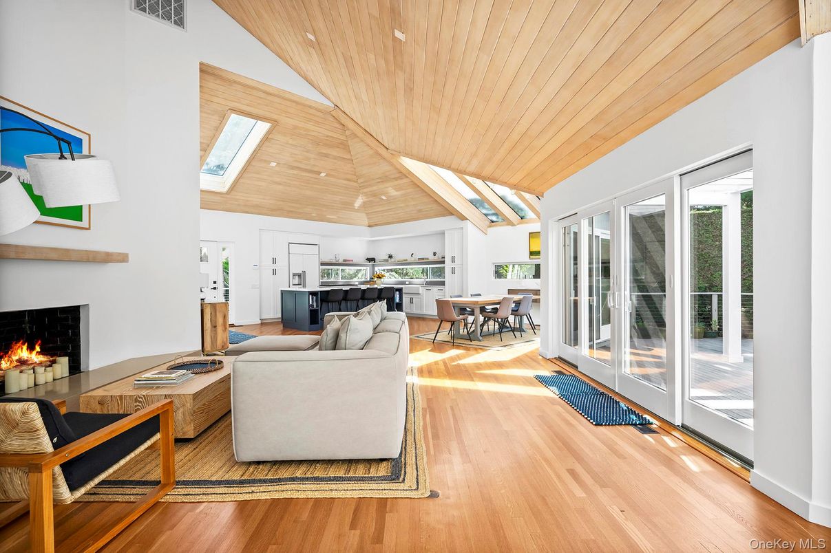 Dining room, Fireplace, Interior, Living room, Pendant Lights, Recessed Lighting, Wooden Ceilings, Wood Texture Flooring