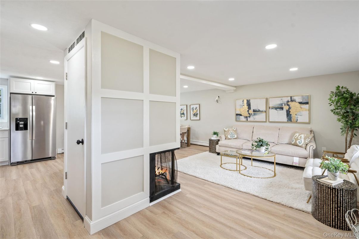 Fireplace, Interior, Living room, Recessed Lighting, Stainless Steel Appliances, Wood Texture Flooring