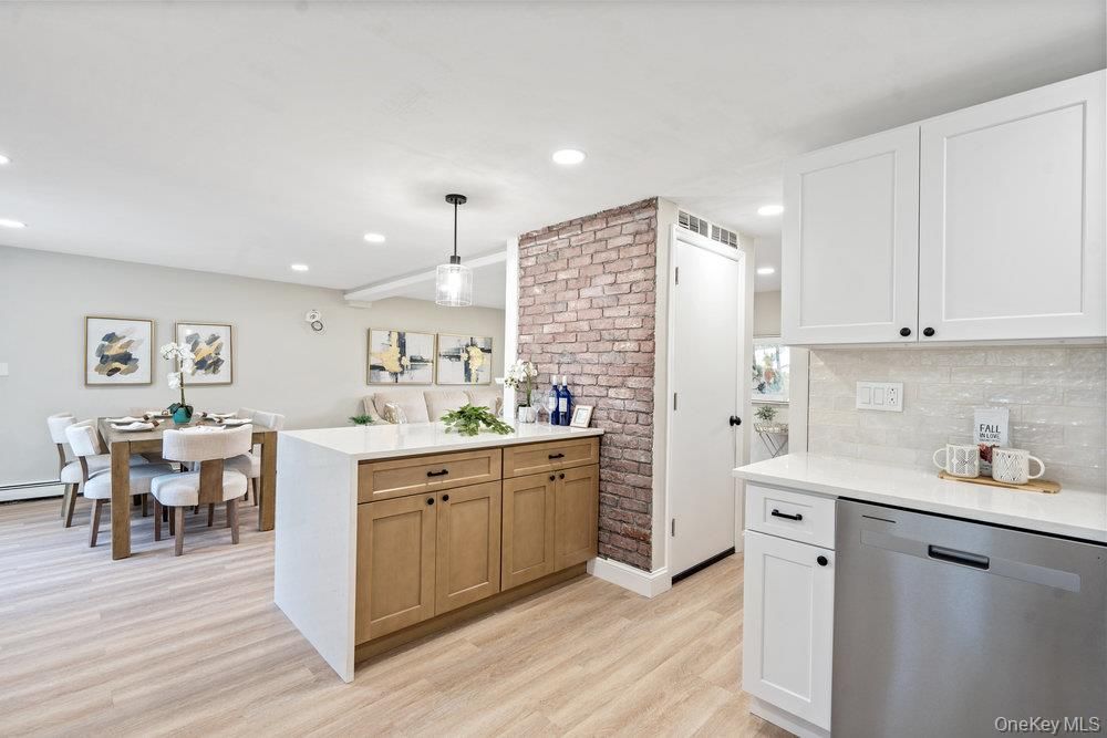 Dining room, Interior, Kitchen, Pendant Lights, Recessed Lighting, Stainless Steel Appliances, Stone Walls, Wood Texture Flooring