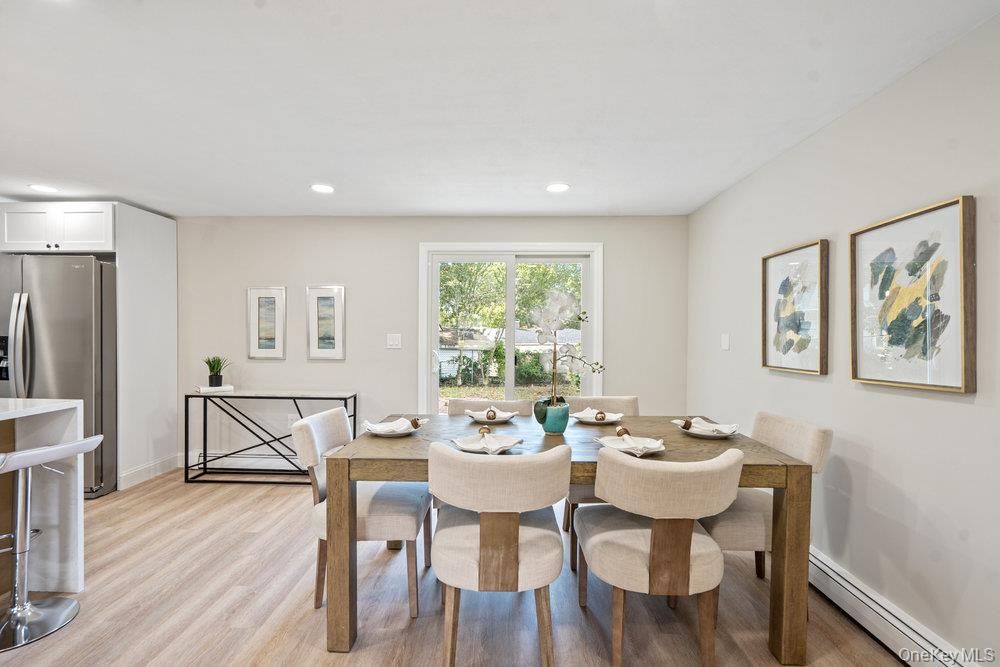 Dining room, Interior, Kitchen, Recessed Lighting, Stainless Steel Appliances, Wood Texture Flooring