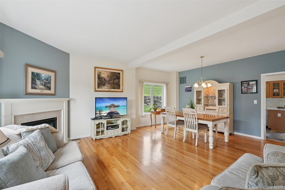 Chandelier, Dining room, Fireplace, Interior, Living room, Pendant Lights, Wood Texture Flooring