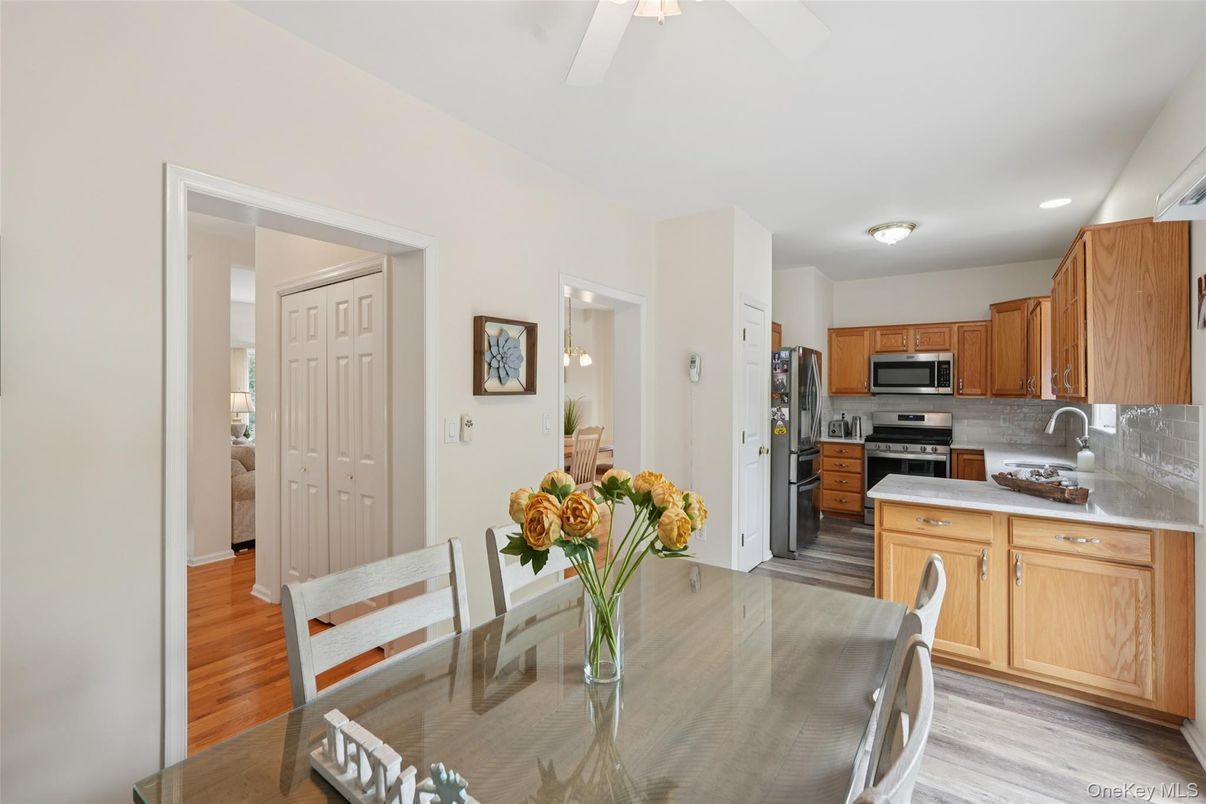 Dining room, Interior, Kitchen, Recessed Lighting, Stainless Steel Appliances, Wood Texture Flooring