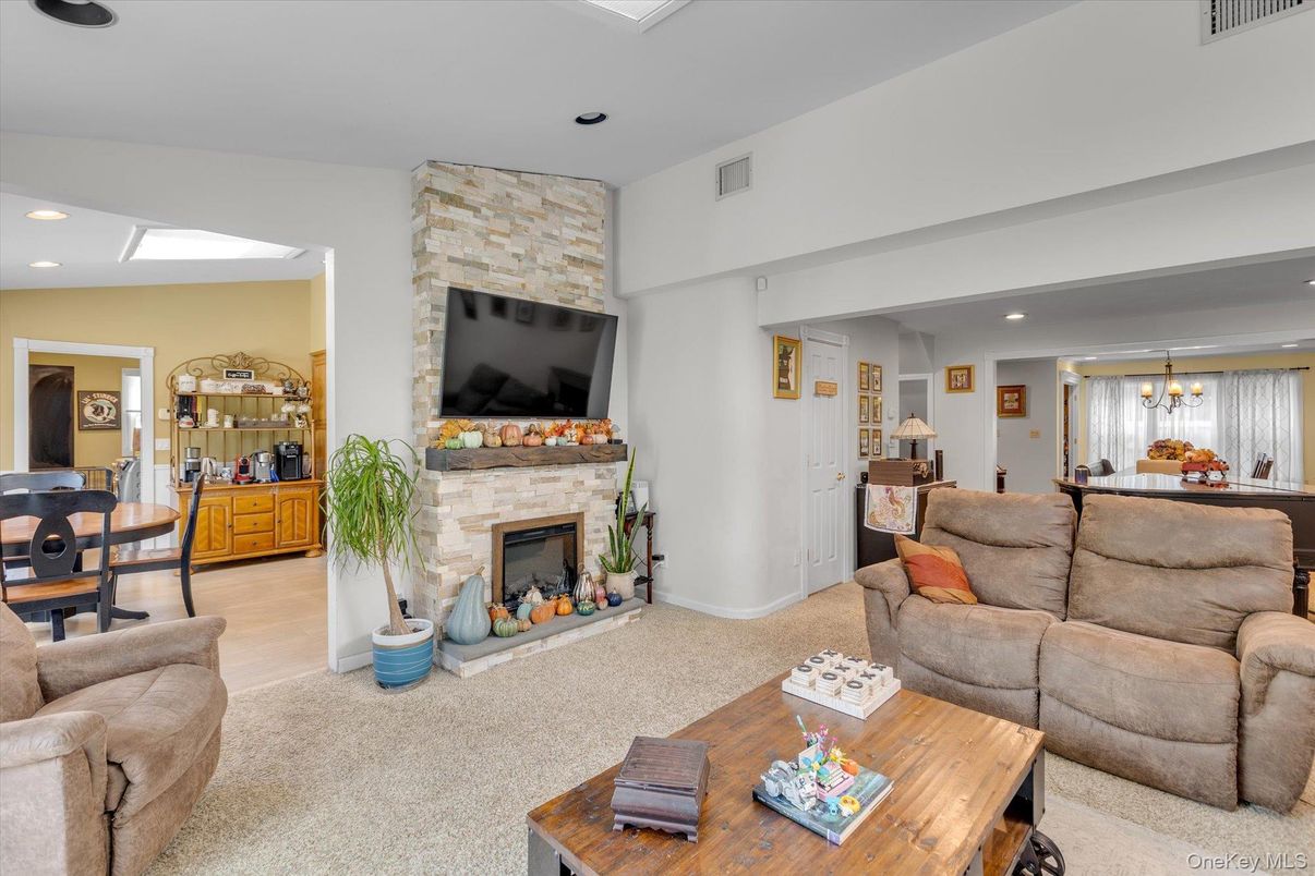 Dining room, Fireplace, Interior, Living room, Pendant Lights, Recessed Lighting, Stone Walls