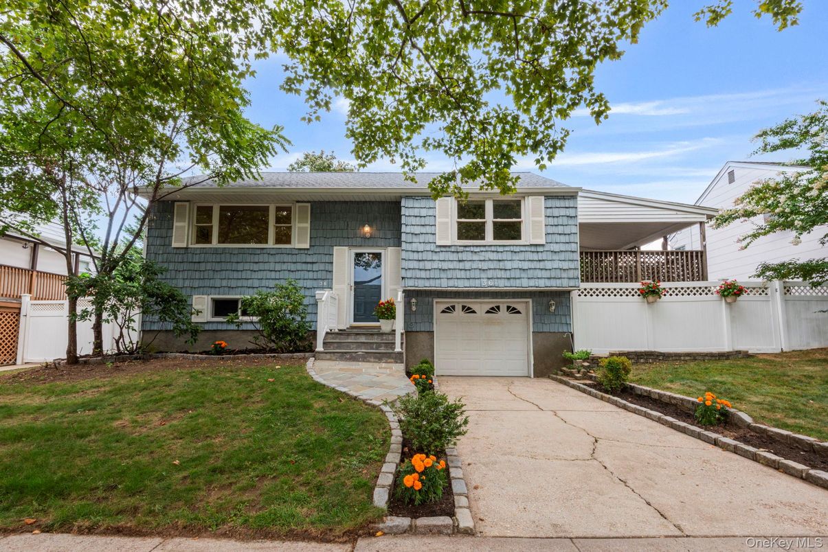 Attached, Exterior, Facade, Raised Ranch