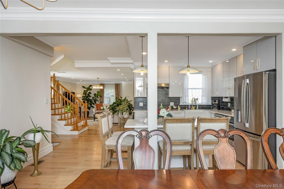 Dining room, Interior, Kitchen, Pendant Lights, Recessed Lighting, Stainless Steel Appliances, Wood Texture Flooring