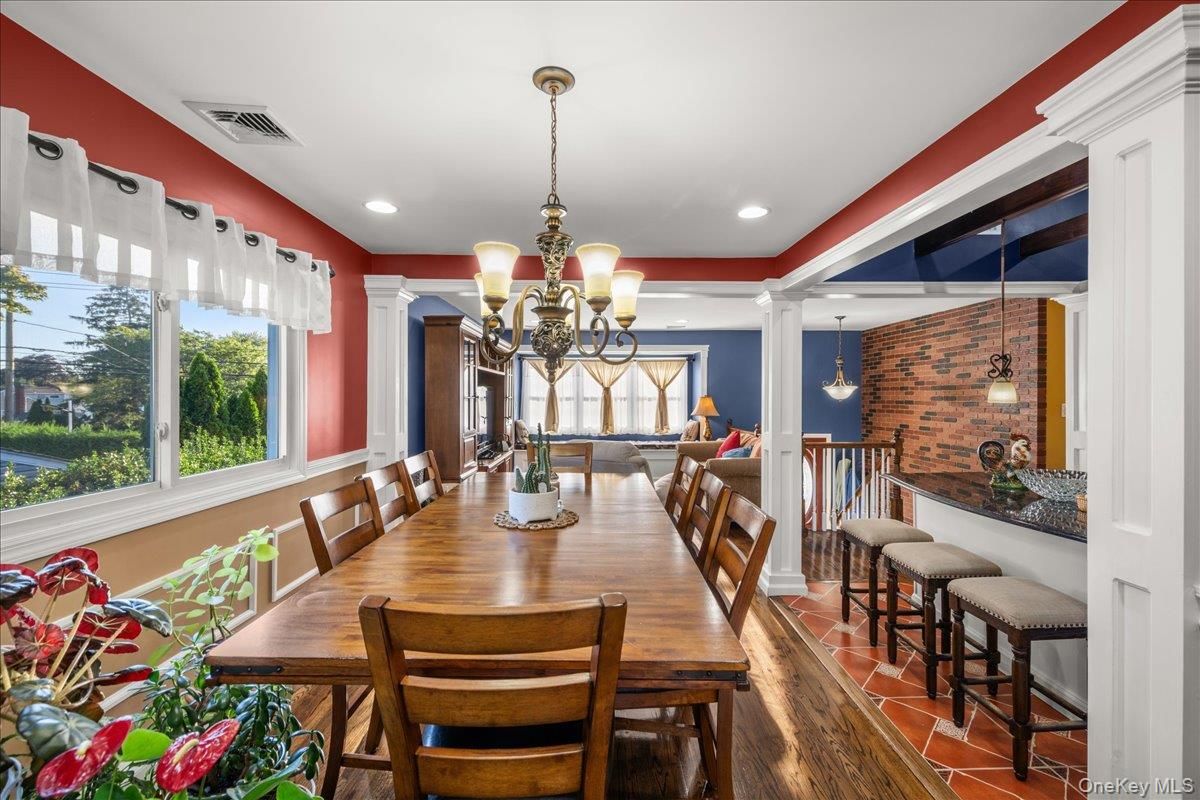 Chandelier, Dining room, Interior, Pendant Lights, Recessed Lighting, Stone Walls, Wood Texture Flooring
