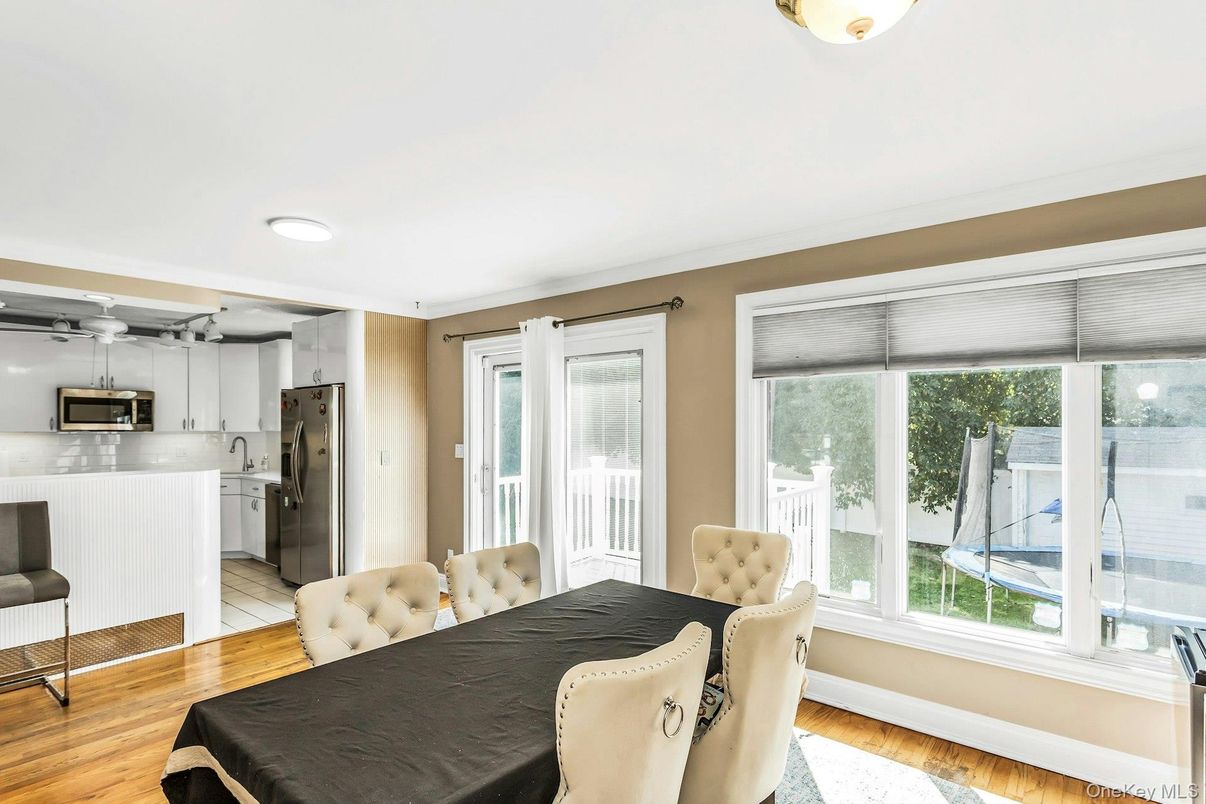 Dining room, Interior, Kitchen, Recessed Lighting, Stainless Steel Appliances, Wood Texture Flooring