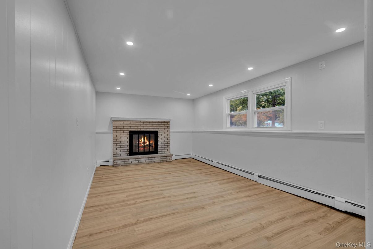Empty room, Fireplace, Interior, Recessed Lighting, Wood Texture Flooring