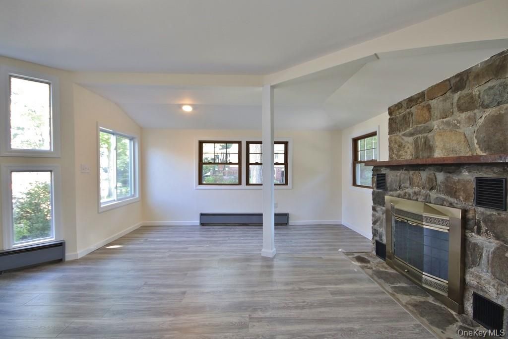 Empty room, Fireplace, Interior, Stone Walls, Wood Texture Flooring