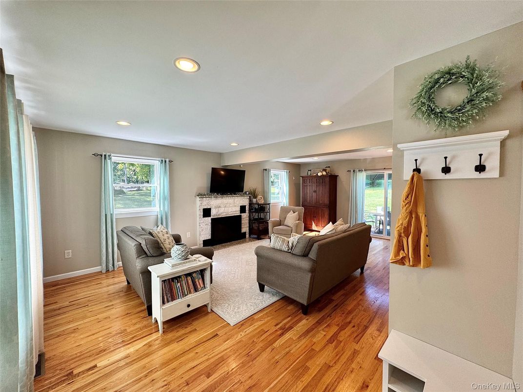 Fireplace, Interior, Living room, Recessed Lighting, Wood Texture Flooring
