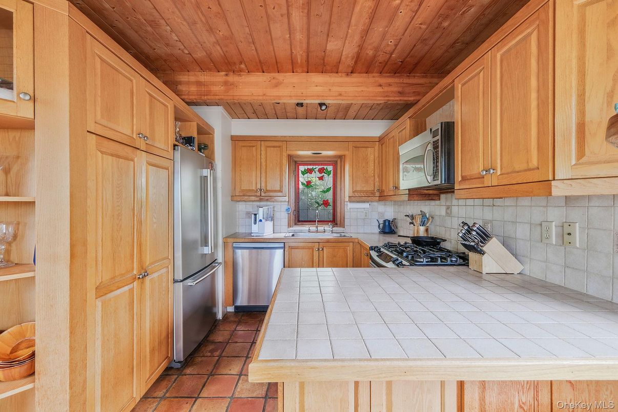 Interior, Kitchen, Stainless Steel Appliances, Tile Countertops, Wooden Ceilings