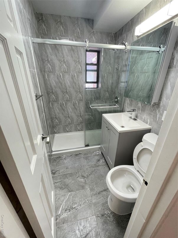 Bathroom, Dual Sink Vanities, Glass Shower, Interior, Marble Walls