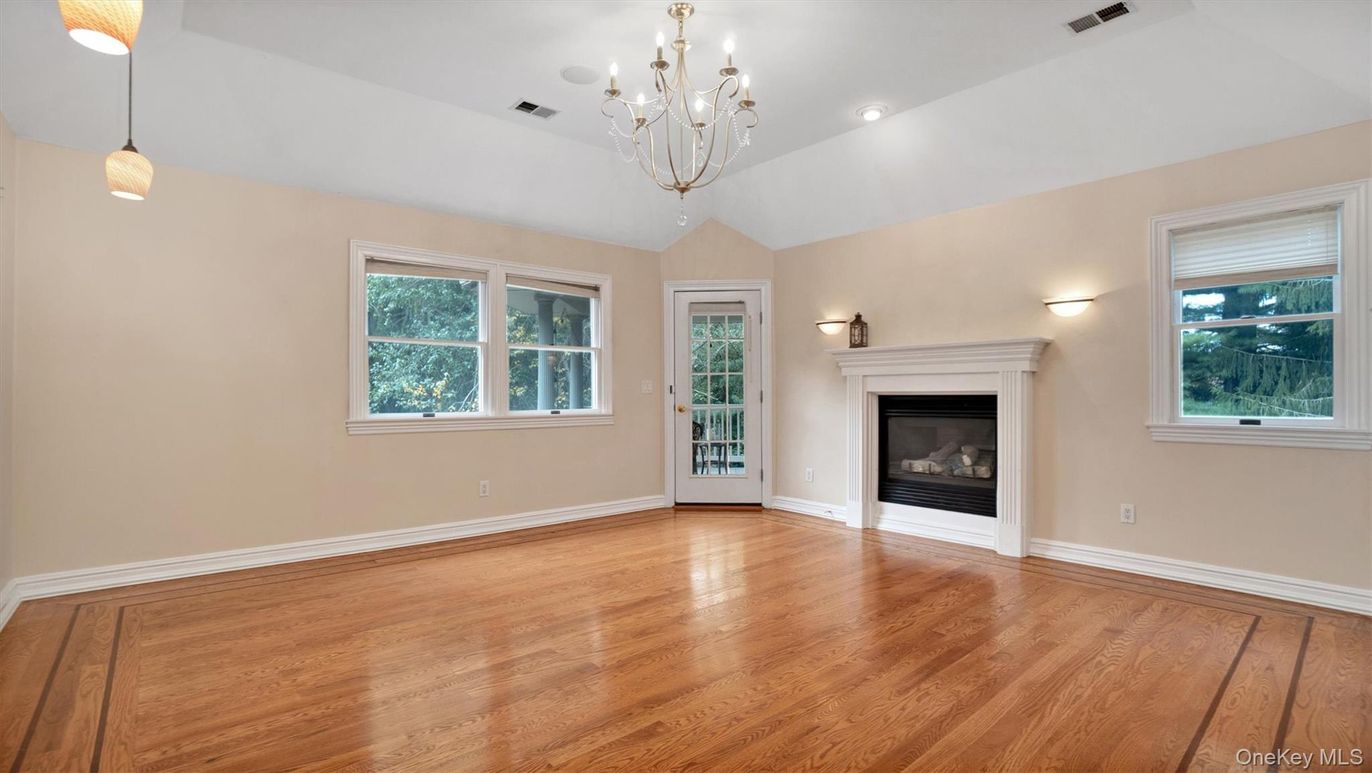 Chandelier, Empty room, Fireplace, Interior, Pendant Lights, Recessed Lighting, Wood Texture Flooring