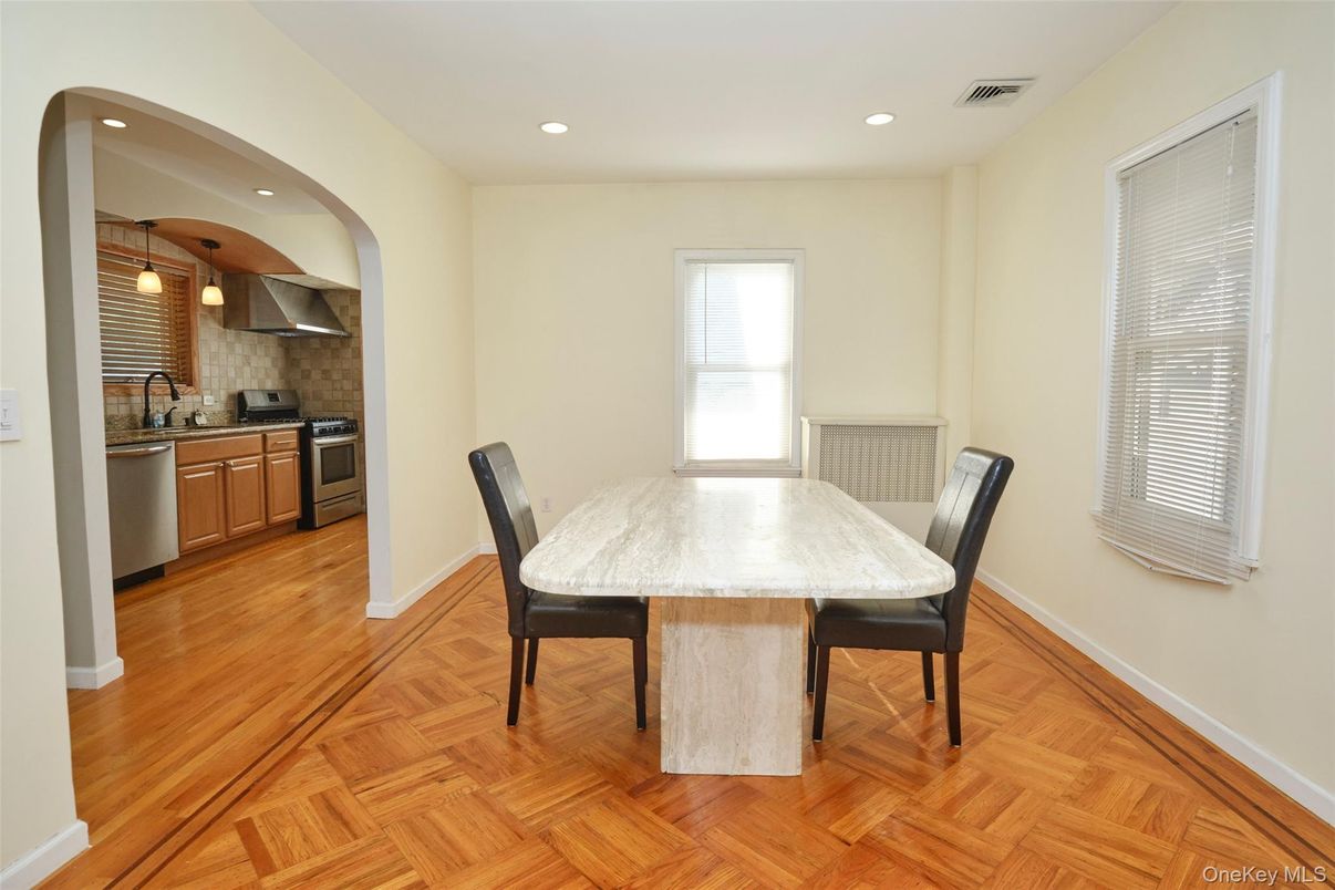 Dining room, Interior, Kitchen, Pendant Lights, Recessed Lighting, Stainless Steel Appliances, Wood Texture Flooring
