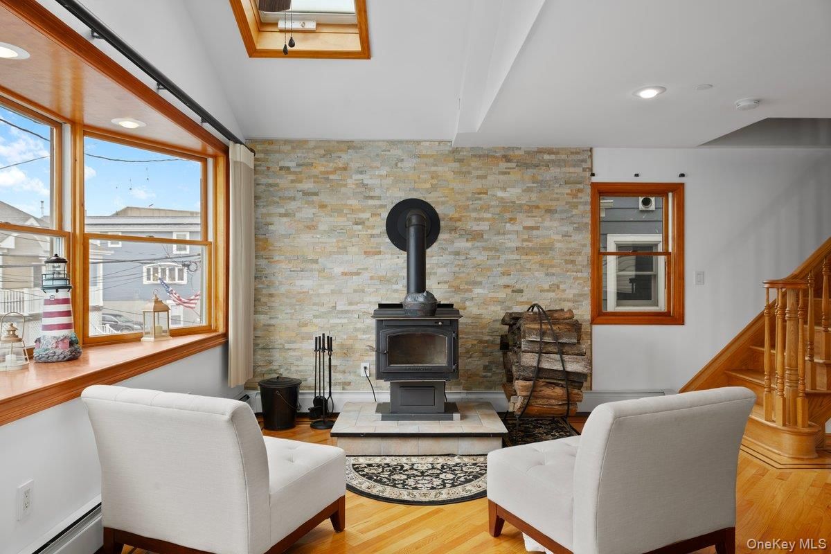 Fireplace, Interior, Recessed Lighting, Stone Walls, Wood Texture Flooring