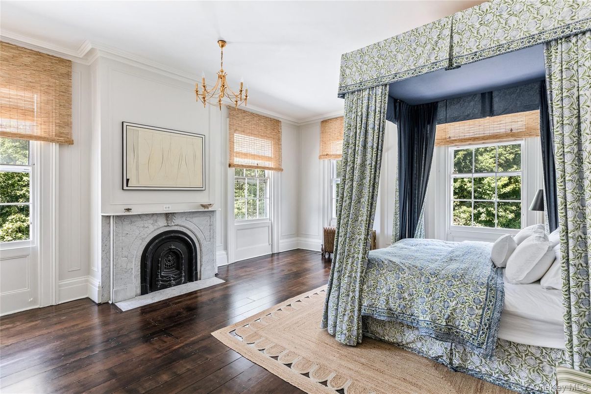 Bedroom, Chandelier, Fireplace, Interior, Wood Texture Flooring