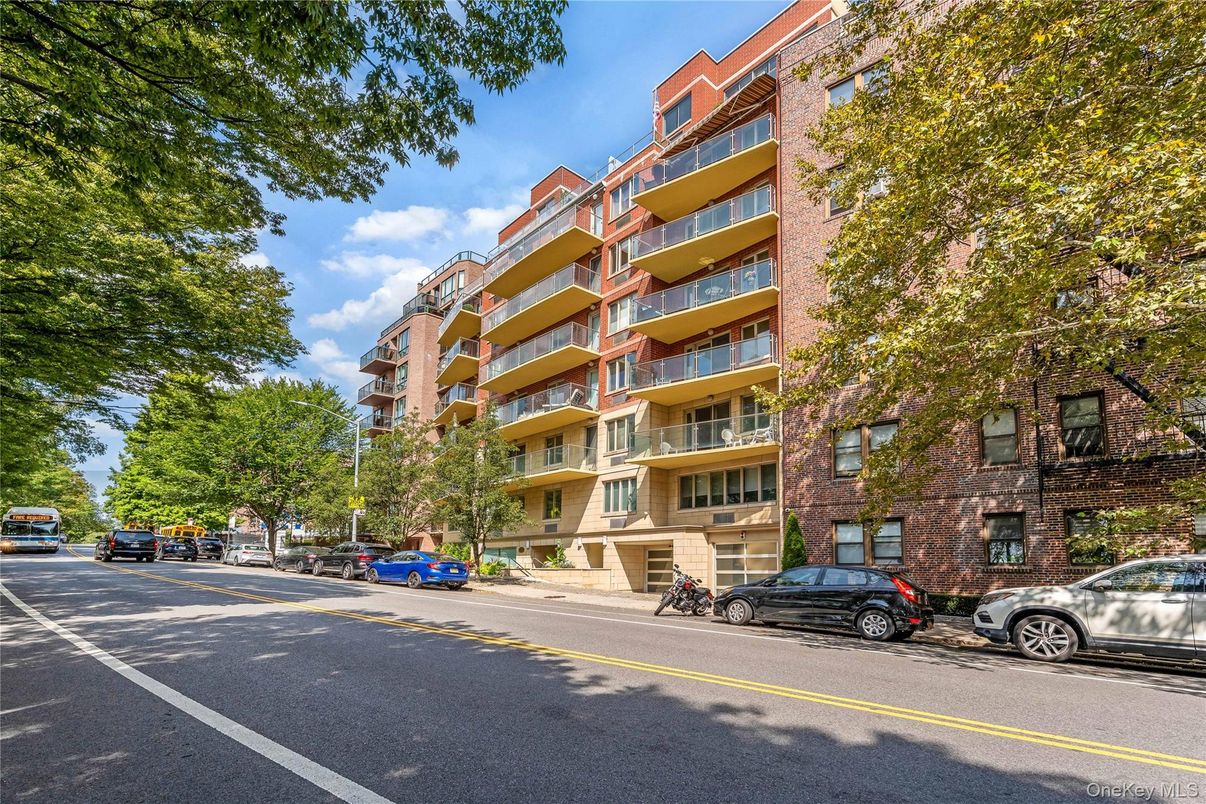 Exterior, Facade, Brick Facade, Condo Building