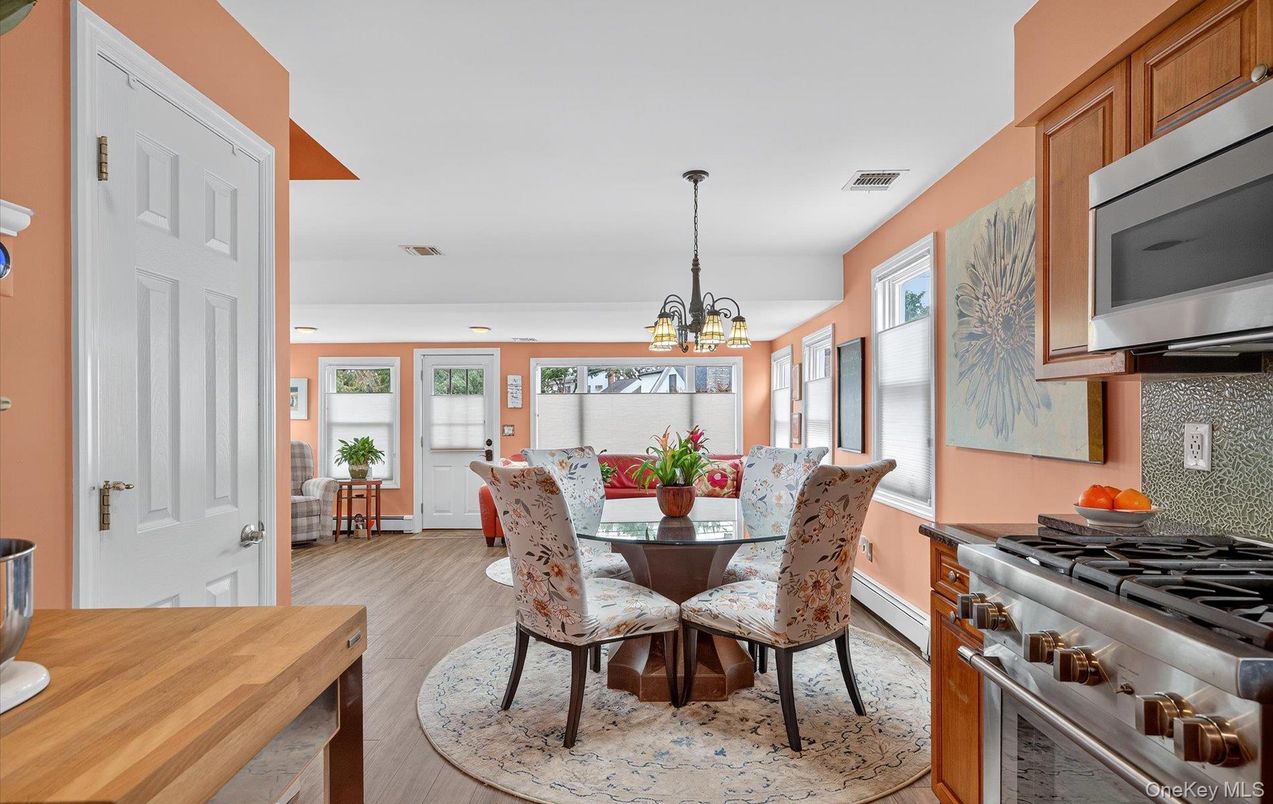 Chandelier, Dining room, Interior, Kitchen, Pendant Lights, Stainless Steel Appliances, Wood Texture Flooring