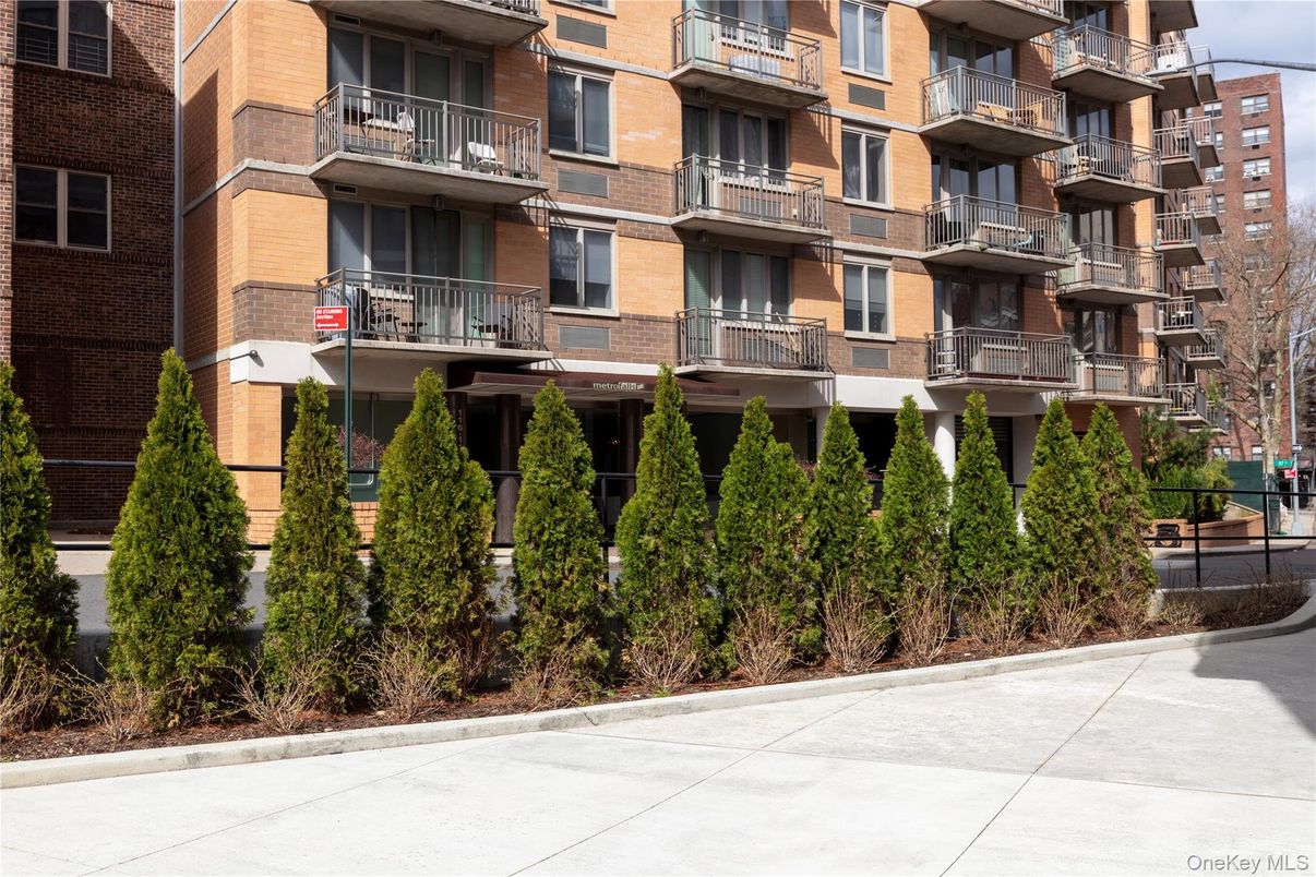 Exterior, Facade, Brick Facade, Condo Building