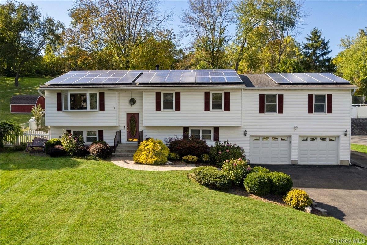 Attached, Exterior, Facade, Solar Panels, Raised Ranch