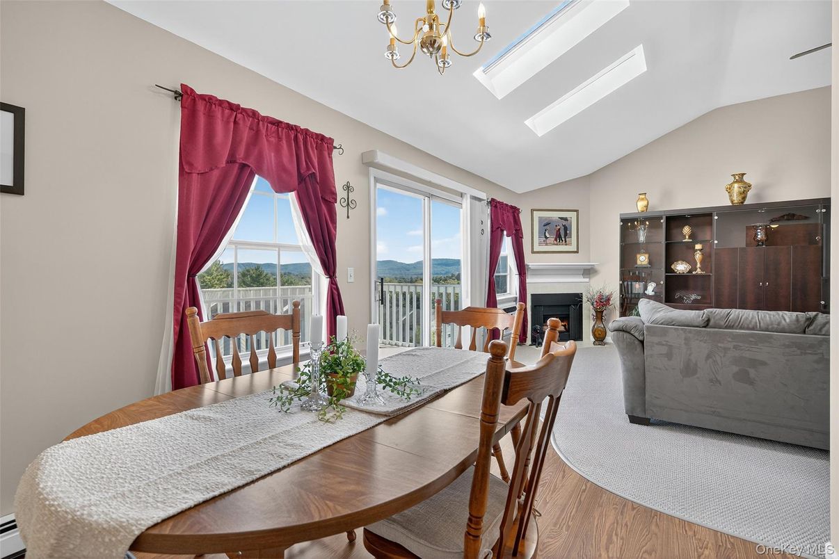 Chandelier, Dining room, Fireplace, Interior, Living room, Wood Texture Flooring