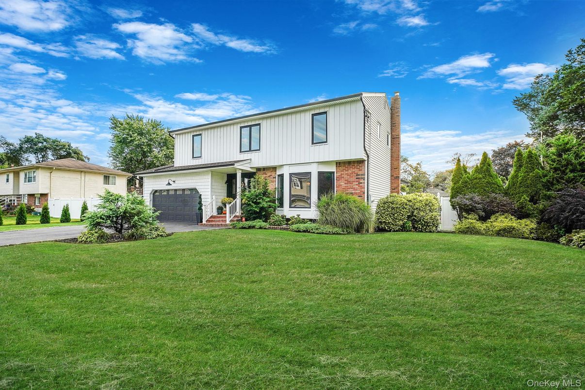 Attached, Backyard, Exterior, Facade, Brick Facade, Farmhouse