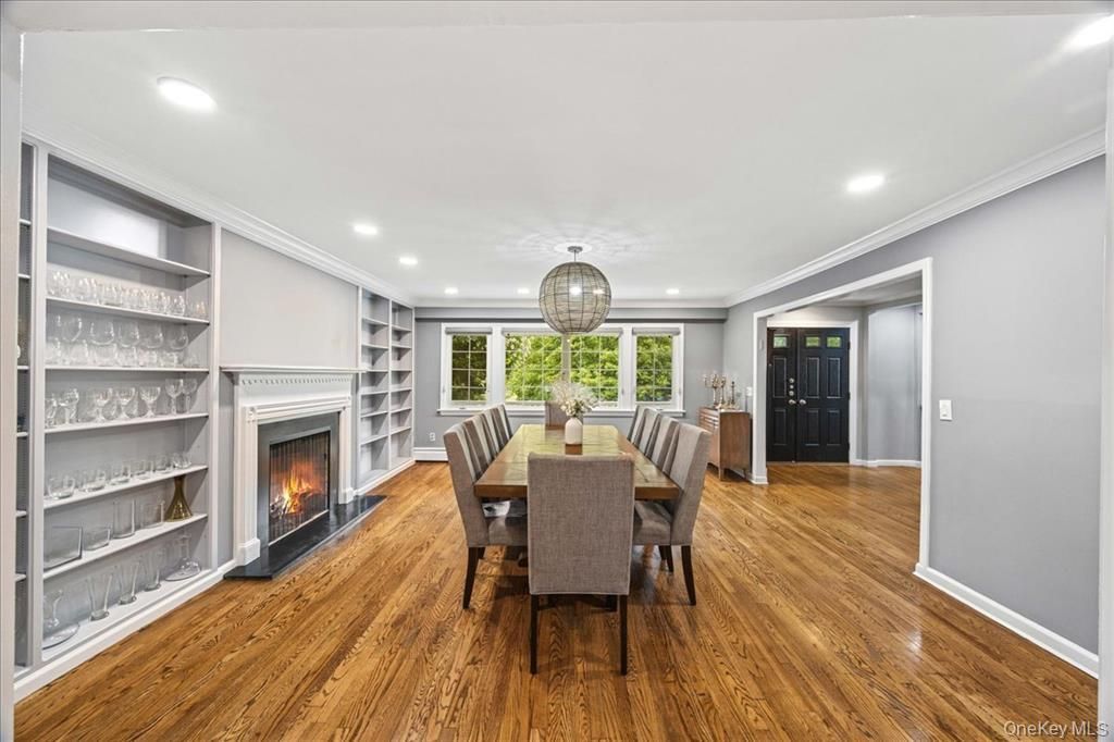 Dining room, Fireplace, Interior, Pendant Lights, Recessed Lighting, Wood Texture Flooring