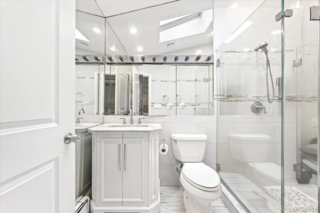 Bathroom, Glass Shower, Interior, Recessed Lighting, Wood Texture Flooring