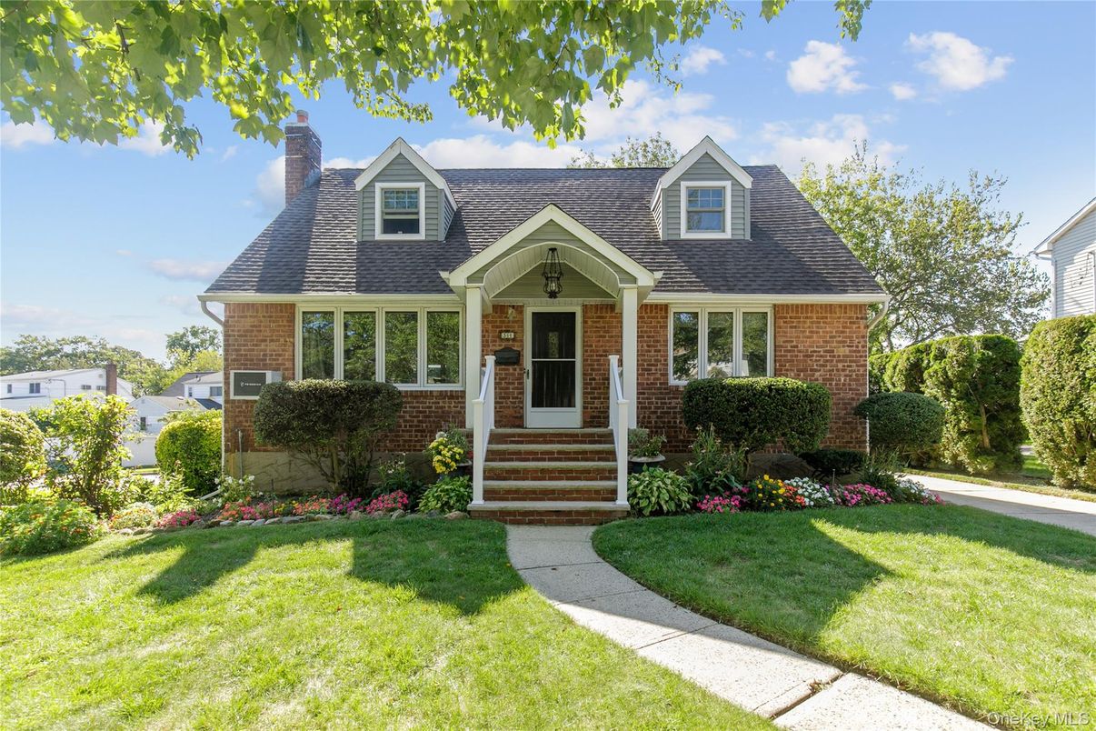 Exterior, Facade, Brick Facade, Cape Cod