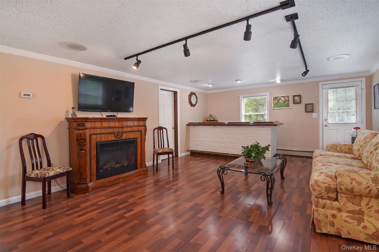 Fireplace, Interior, Living room, Recessed Lighting, Wood Texture Flooring
