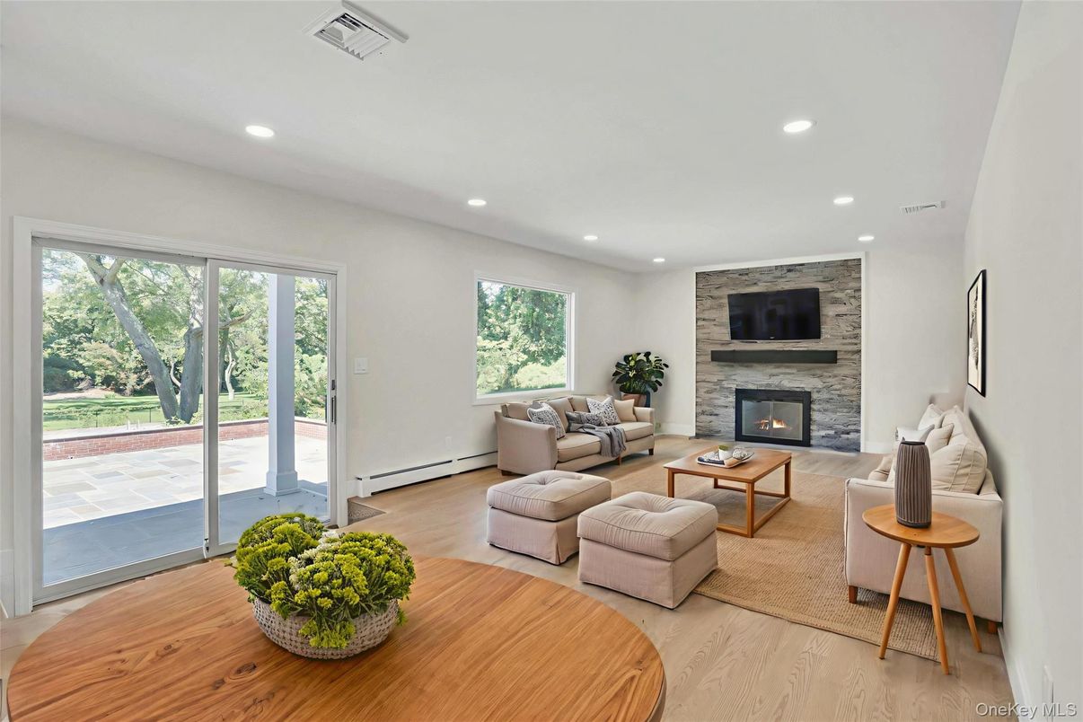 Fireplace, Interior, Living room, Recessed Lighting, Stone Walls, Wood Texture Flooring