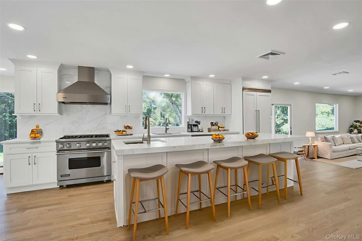 Interior, Kitchen, Living room, Marble Walls, Recessed Lighting, Stainless Steel Appliances, Wood Texture Flooring